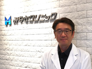 医師：岡田　憲幸